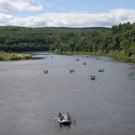 wide view of Delaware River with rafters enjoying the day Indian Head Canoeing Rafting Kayaking Tubing Delaware River