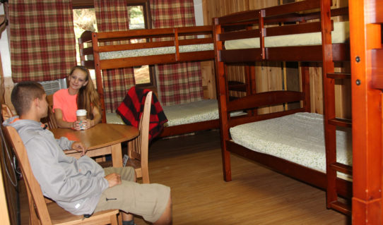 two teens relaxing in cabin Indian Head Canoeing Rafting Kayaking Tubing Delaware River