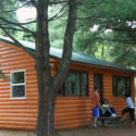 three people outside cabin Indian Head Canoeing Rafting Kayaking Tubing Delaware River