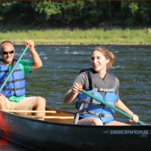 two people enjoying a sunny day on river in canoe Indian Head Canoeing Rafting Kayaking Tubing Delaware River