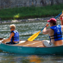 father and son enjoying calm waters in canoe Indian Head Canoeing Rafting Kayaking Tubing Delaware River