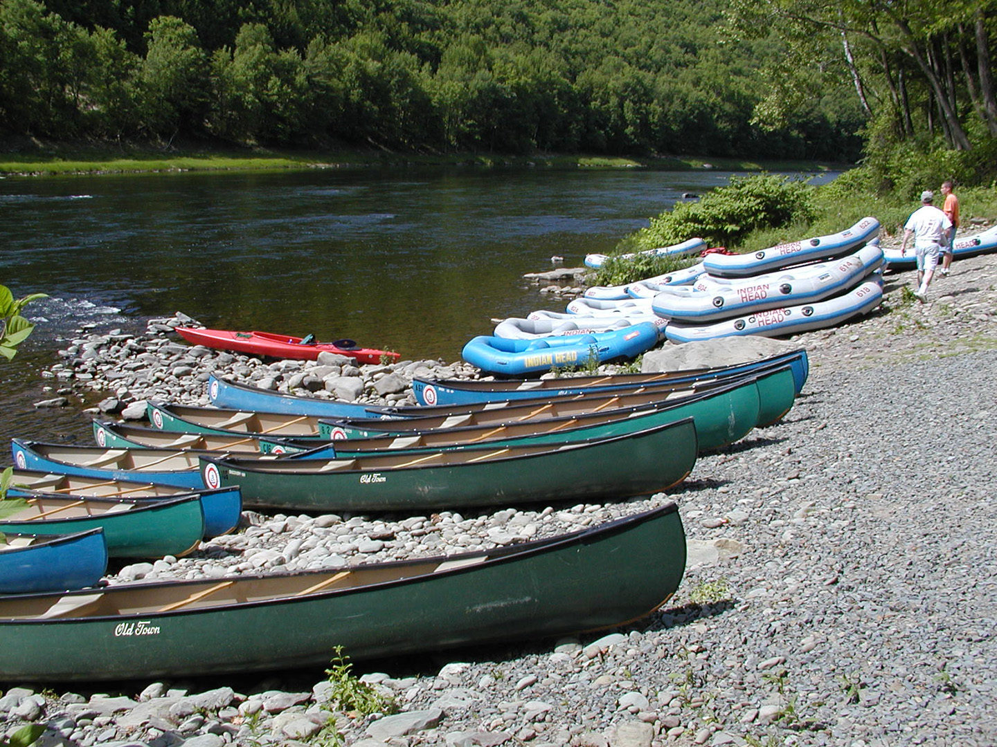 canoes kayaks rafts staged ashore Indian Head Canoeing Rafting Kayaking Tubing Delaware River