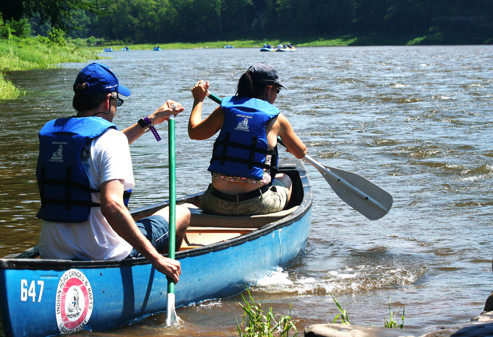 male and female team in canoe starting their tour Indian Head Canoeing Rafting Kayaking Tubing Delaware River