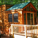 log cabin and deck on the Delaware River on a sunny day