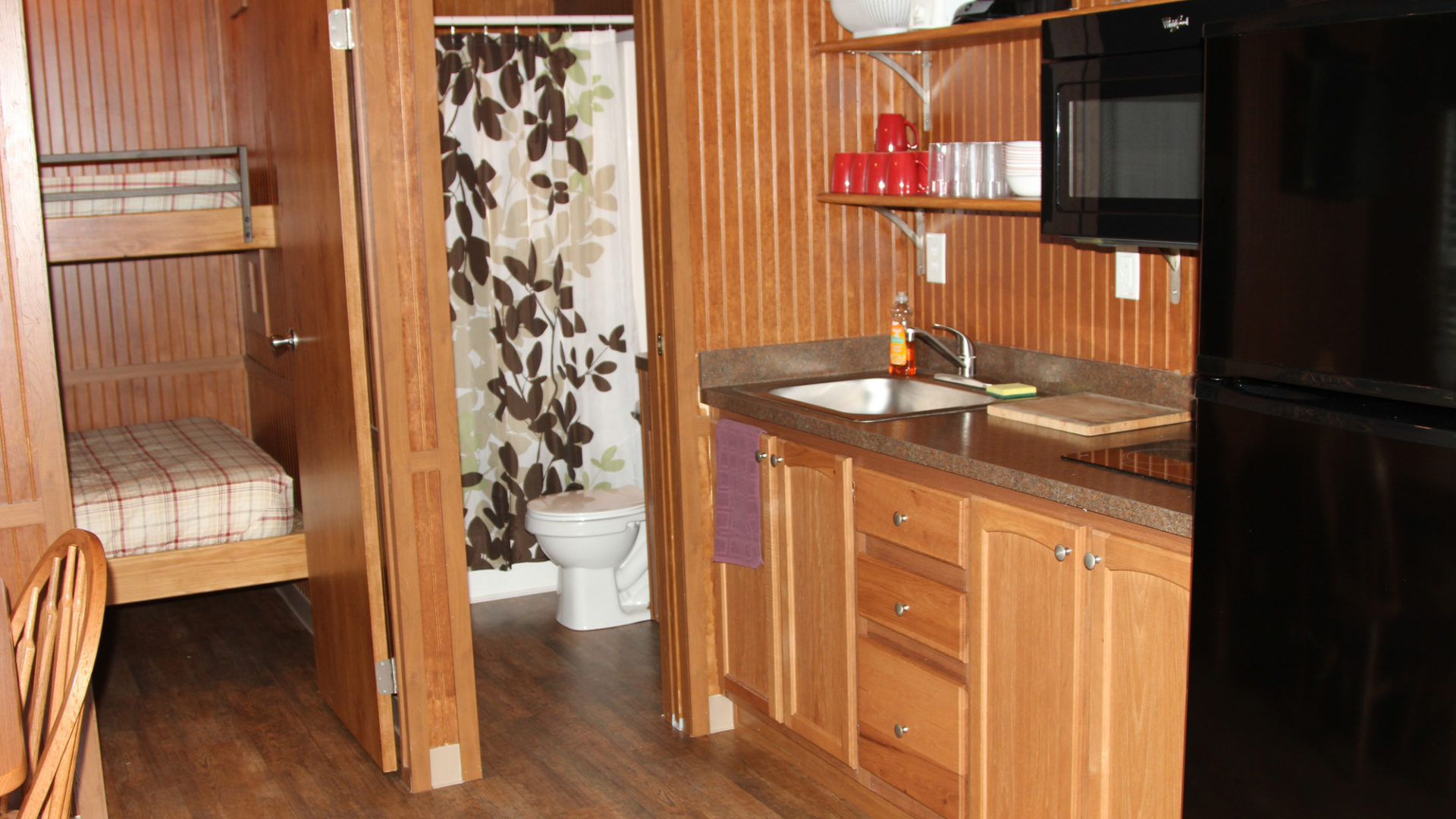 inside amenities included in the deluxe cabin with open floor layout