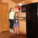 mom and daughter preparing breakfast in cabin Indian Head Canoeing Rafting Kayaking Tubing Delaware River