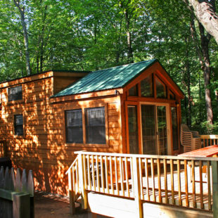 cabin and deck on sunny day Indian Head Canoeing Rafting Kayaking Tubing Delaware River