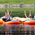 group of 7 enjoying calm waters and scenic views on river Indian Head Canoeing Rafting Kayaking Tubing Delaware River