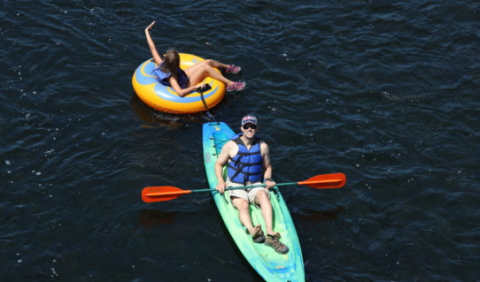 dad in kayak with daughter following in tube Indian Head Canoeing Rafting Kayaking Tubing Delaware River