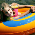 young girl enjoying her tube ride down the river Indian Head Canoeing Rafting Kayaking Tubing Delaware River