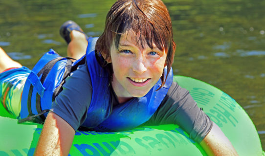 close up of young boy in tube Indian Head Canoeing Rafting Kayaking Tubing Delaware River