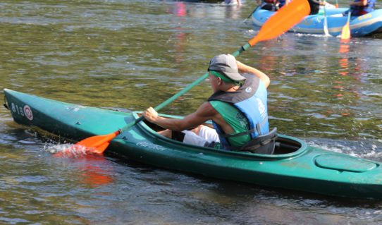 man in kayak showing his strength Indian Head Canoeing Rafting Kayaking Tubing Delaware River