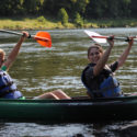 two people in kayak holding up paddles as they finish their tour Indian Head Canoeing Rafting Kayaking Tubing Delaware River