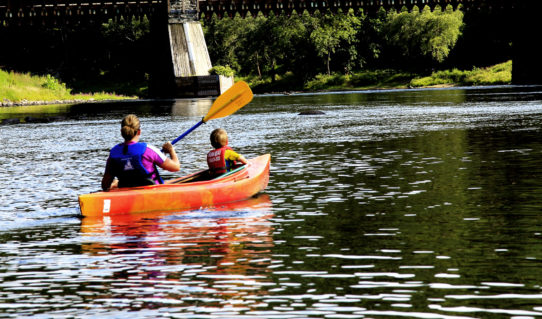 mom and son in kayak on calm waters Indian Head Canoeing Rafting Kayaking Tubing Delaware River