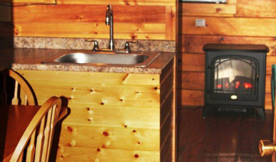 inside view of small fireplace in cabin Indian Head Canoeing Rafting Kayaking Tubing Delaware River