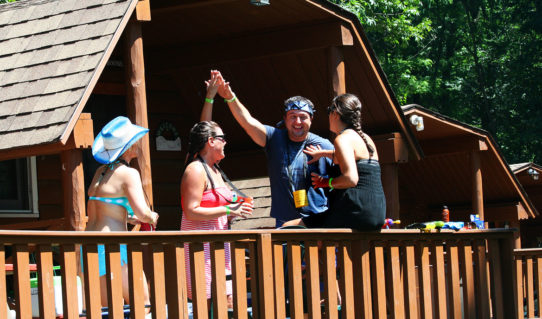 friends enjoying deck on cabin Indian Head Canoeing Rafting Kayaking Tubing Delaware River