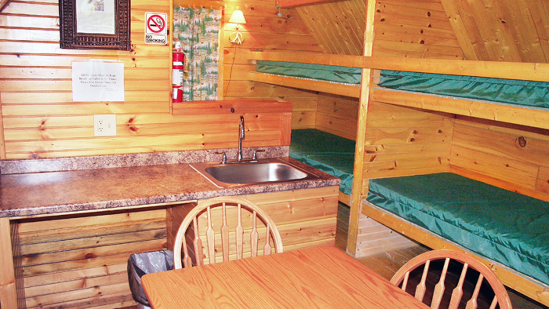 inside cabin with bunk beds and kitchenette Indian Head Canoeing Rafting Kayaking Tubing Delaware River