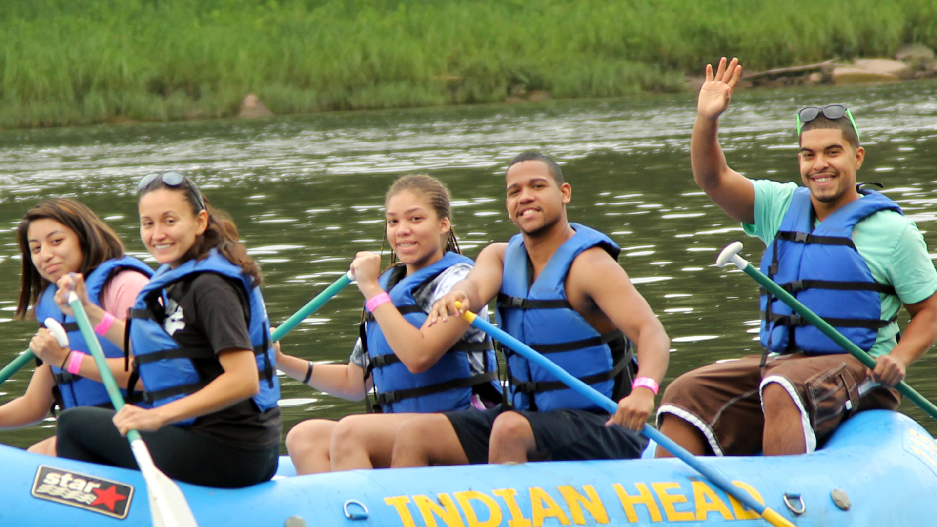 5 people in raft during calm waters Indian Head Canoeing Rafting Kayaking Tubing Delaware River