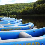 rafts staged on shore ready for guests Indian Head Canoeing Rafting Kayaking Tubing Delaware River