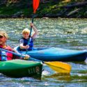 father and son in separate kayaks Indian Head Canoeing Rafting Kayaking Tubing Delaware River