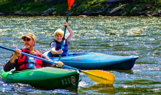 father and son in separate kayaks Indian Head Canoeing Rafting Kayaking Tubing Delaware River